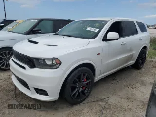 2020 Dodge Durango SRT with VIN 1C4SDJGJ5LC413083, listed as a Copart auction lot 74073554 with 47,575 mi miles and Non Repairable. Bid and sale history available at carsss.com. Image 1.