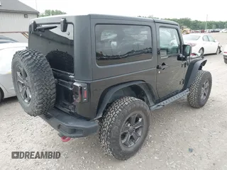 2018 Jeep Wrangler Rubicon Recon with VIN 1C4BJWCG6JL814834, listed as a IAAI auction lot 42327297 with 59,623 mi miles and . Bid and sale history available at DreamBid. Image 4.