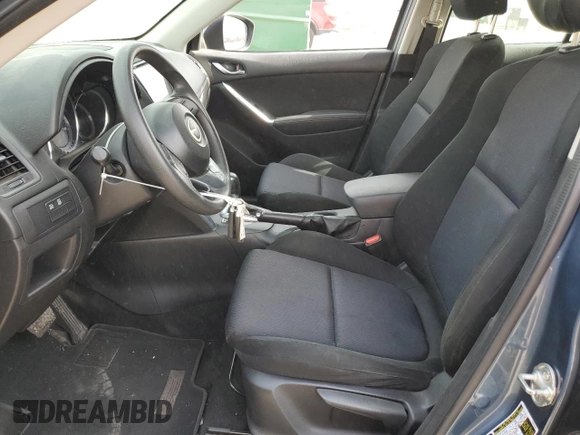 2015 Mazda CX-5 Sport z VIN JM3KE2BE8F0434116, wystawiony jako Copart lot #60712625 z przebiegiem 300 405 mil mil oraz Szkoda całkowita • Salvage title. Historia ofert i sprzedaży dostępna na DreamBid. Obrazek 7.