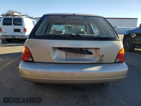 1999 Saturn SW z VIN 1G8ZK8271XZ368987, wystawiony jako Copart lot #82610964 z przebiegiem 222 100 mil mil oraz Czysty tytuł • Clean title. Historia ofert i sprzedaży dostępna na DreamBid. Obrazek 6.