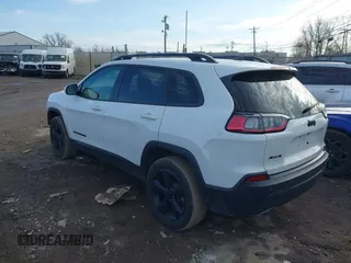 2020 Jeep Cherokee Altitude with VIN 1C4PJMLX0LD501883, listed as a IAAI auction lot 41141170 with 134,071 mi miles. Bid and sale history available at carsss.com. Image 3.