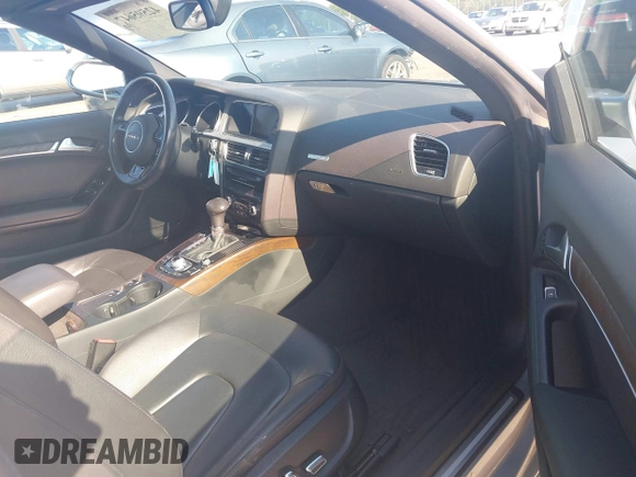 2016 Audi A5 Premium with VIN WAUD2AFHXGN005246, listed as a IAAI auction lot 42595647 with 56,602 mi miles and . Bid and sale history available at DreamBid. Image 5.