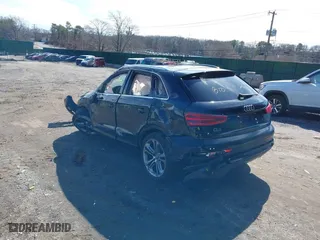 2015 Audi Q3 2.0T Premium Plus with VIN WA1EFCFS4FR001441, listed as a IAAI auction lot 41813239 with 112,795 mi miles. Bid and sale history available at carsss.com. Image 3.