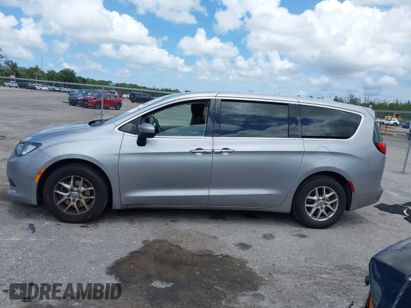 2017 Chrysler Pacifica Touring with VIN 2C4RC1DG7HR516711, listed as a IAAI auction lot 42633544 with 97,853 mi miles and . Bid and sale history available at DreamBid. Image 14.