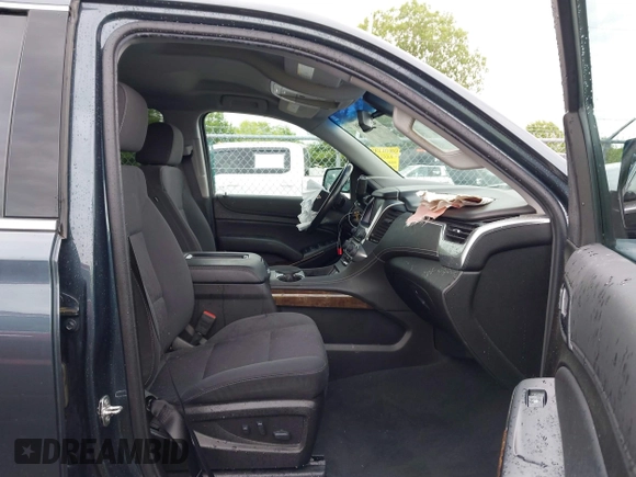 2019 Chevrolet Suburban LS with VIN 1GNSKGKC7KR244916, listed as a IAAI auction lot 42315858 with 69,555 mi miles and . Bid and sale history available at DreamBid. Image 5.