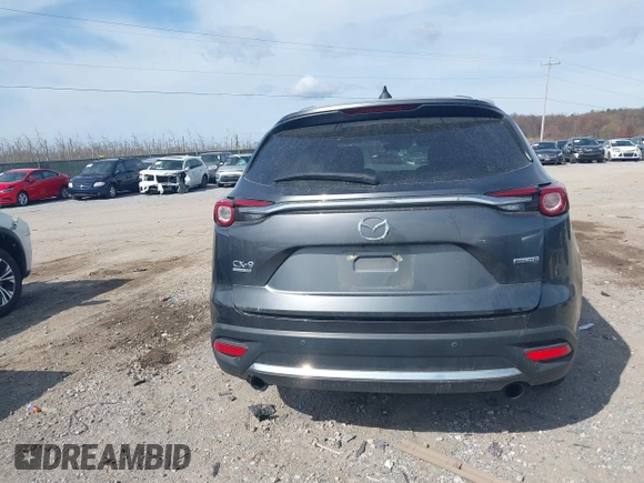2021 Mazda CX-9 Signature with VIN JM3TCBEY5M0523199, listed as a IAAI auction lot 41916480 with 56,772 mi miles. Bid and sale history available at carsss.com. Image 16.