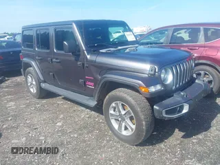 2021 Jeep Wrangler Unlimited Sahara with VIN 1C4HJXEN5MW625834, listed as a IAAI auction lot 42635428 with 81,888 mi miles and . Bid and sale history available at DreamBid. Image 1.