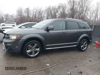 2017 Dodge Journey Crossroad Plus z VIN 3C4PDCGB5HT501363, wystawiony jako IAAI lot #41178334 z przebiegiem 119 076 mil mil oraz . Historia ofert i sprzedaży dostępna na DreamBid. Obrazek 15.