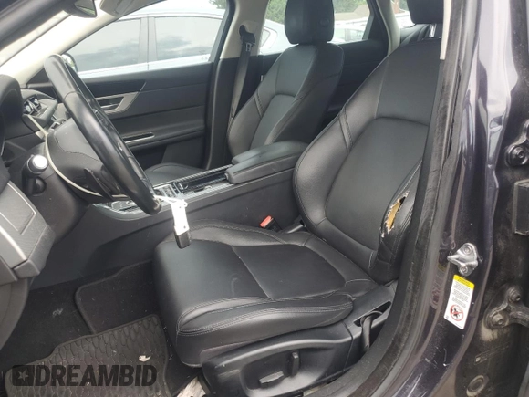 2017 Jaguar XF with VIN SAJBJ4BNXHCY42877, listed as a Copart auction lot 64552565 with 137,438 mi miles and Clean title. Bid and sale history available at DreamBid. Image 7.