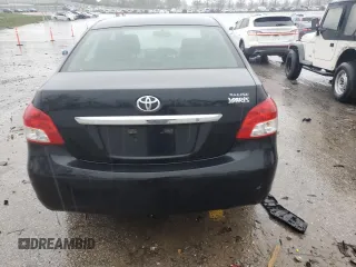 2012 Toyota Yaris with VIN JTDBT4K33CL035567, listed as a Copart auction lot 51837505 with 233,895 mi miles and Salvage Title. Bid and sale history available at DreamBid. Image 6.