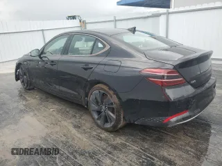 2023 Genesis G70 2.0T with VIN KMTG34TA0PU120533, listed as a Copart auction lot 73781104 with 26,932 mi miles and Clean Title. Bid and sale history available at carsss.com. Image 2.
