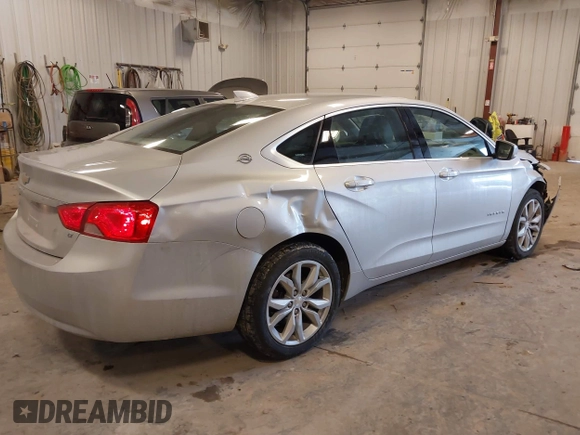 2018 Chevrolet Impala LT with VIN 2G1105S3XJ9102236, listed as a IAAI auction lot 41433120 with 113,476 mi miles and . Bid and sale history available at DreamBid. Image 4.