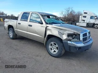 2005 Dodge Dakota SLT with VIN 1D7HW48N45S199371, listed as a IAAI auction lot 41792900 with 170,893 mi miles. Bid and sale history available at carsss.com. Image 1.