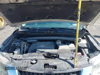2015 Nissan Pathfinder Platinum with VIN 5N1AR2MMXFC615001, listed as a IAAI auction lot 42810501 with 206,247 mi miles and . Bid and sale history available at DreamBid. Image 10.