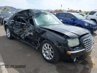 2008 Chrysler 300 C Hemi with VIN 2C3KA63H18H335466, listed as a IAAI auction lot 41899381 with Not Provided miles and . Bid and sale history available at carsss.com. Image 6.