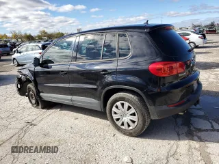 2014 Volkswagen Tiguan with VIN WVGCV3AXXEW604117, listed as a Copart auction lot 78791874 with 194,837 mi miles and Salvage Title. Bid and sale history available at DreamBid. Image 2.