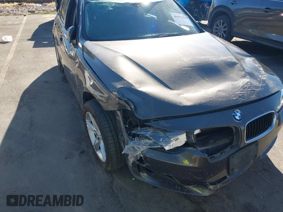 2014 BMW 3 Series 328d xDrive with VIN WBA3D5C58EKX97290, listed as a IAAI auction lot 40453599 with Not Provided miles. Bid and sale history available at carsss.com. Image 6.