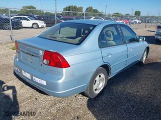 2003 Honda Civic Hybrid with VIN JHMES95673S023624, listed as a IAAI auction lot 40258910 with 181,949 mi miles. Bid and sale history available at carsss.com. Image 4.
