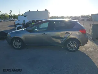 2011 Kia Forte 5-Door EX with VIN KNAFU5A2XB5417673, listed as a IAAI auction lot 41825573 with 129,811 mi miles. Bid and sale history available at carsss.com. Image 14.