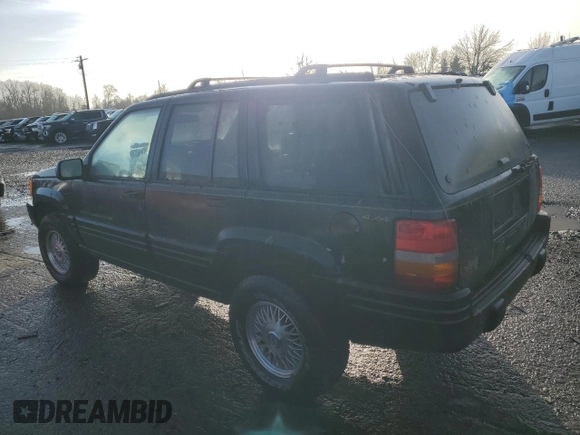 1998 Jeep Grand Cherokee Limited with VIN 1J4GZ78S0WC138917, listed as a Copart auction lot 86223974 with 152,482 mi miles and Clean title. Bid and sale history available at DreamBid. Image 2.