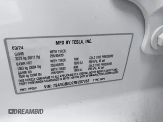 2024 Tesla Model Y with VIN 7SAYGDED2RF207783, listed as a IAAI auction lot 41758143 with Not Provided miles and . Bid and sale history available at DreamBid. Image 9.