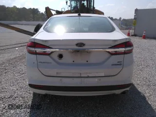 2017 Ford Fusion Hybrid SE with VIN 3FA6P0LU8HR409689, listed as a Copart auction lot 64359324 with 129,883 mi miles and Clean title. Bid and sale history available at DreamBid. Image 6.