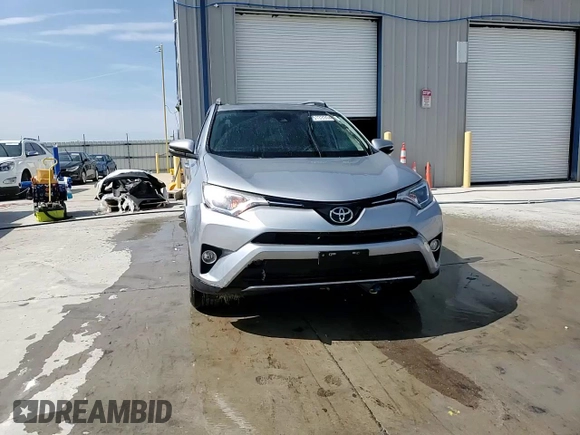 2018 Toyota RAV4 XLE with VIN 2T3RFREV3JW740122, listed as a Copart auction lot 51339045 with 115,293 mi miles and Salvage Title. Bid and sale history available at DreamBid. Image 14.