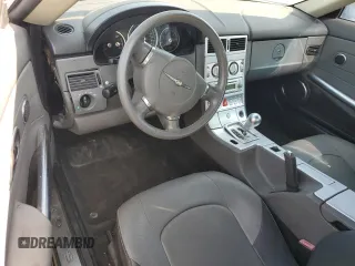 2005 Chrysler Crossfire Limited с VIN 1C3AN65L95X037773, выставлен на аукционе Copart как лот 59632735 с пробегом Не указан миль и Списание • Salvage title. История ставок и продаж доступна на DreamBid. Изображение 8.