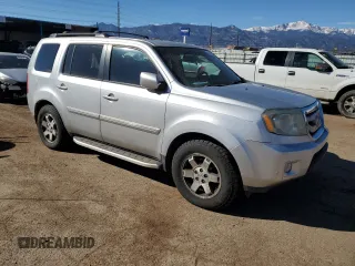 2011 Honda Pilot Touring with VIN 5FNYF4H91BB097502, listed as a Copart auction lot 46955975 with 189,748 mi miles and Salvage Title. Bid and sale history available at DreamBid. Image 4.
