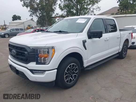 2021 Ford F-150 XL with VIN 1FTEW1CP7MKE89476, listed as a IAAI auction lot 42299954 with 152,473 mi miles and . Bid and sale history available at DreamBid. Image 2.