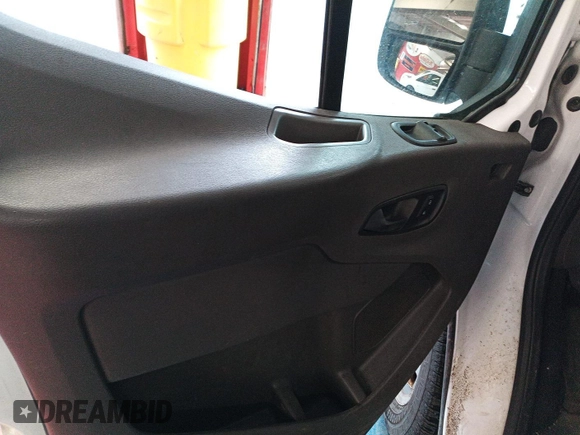2021 Ford Transit Cargo with VIN 1FTBR2YG2MKA51800, listed as a IAAI auction lot 42793917 with 61,733 mi miles and . Bid and sale history available at DreamBid. Image 14.