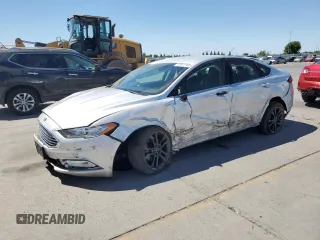 2018 Ford Fusion SE z VIN 3FA6P0LU7JR115531, wystawiony jako Copart lot #57817765 z przebiegiem 177 036 mil mil oraz Czysty tytuł • Clean title. Historia ofert i sprzedaży dostępna na DreamBid. Obrazek 1.