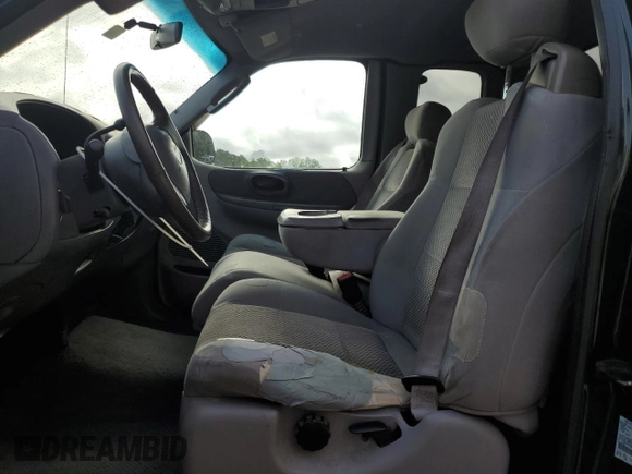 2003 Ford F-150 XL with VIN 1FTRX07WX3KB99581, listed as a Copart auction lot 56907765 with 232,597 mi miles and Salvage title. Bid and sale history available at DreamBid. Image 8.