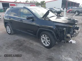 2014 Jeep Cherokee Altitude with VIN 1C4PJMCB5EW146365, listed as a IAAI auction lot 42021350 with 120,652 mi miles and . Bid and sale history available at carsss.com. Image 1.