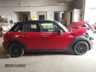 2020 MINI Hardtop 4 Door Cooper z VIN WMWXU7C07L2L48763, wystawiony jako IAAI lot #41948131 z przebiegiem 20 083 mil mil oraz . Historia ofert i sprzedaży dostępna na DreamBid. Obrazek 14.