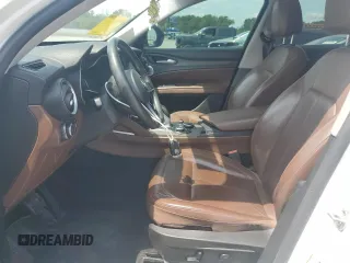 2018 Alfa Romeo Stelvio Ti z VIN ZASFAKBN8J7B79495, wystawiony jako Copart lot #55599025 z przebiegiem 143 606 mil mil oraz Szkoda całkowita • Salvage title. Historia ofert i sprzedaży dostępna na DreamBid. Obrazek 7.
