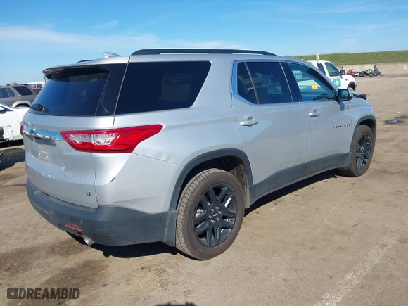 2019 Chevrolet Traverse LT Leather with VIN 1GNEVHKW0KJ126807, listed as a IAAI auction lot 41681930 with 90,320 mi miles. Bid and sale history available at carsss.com. Image 4.
