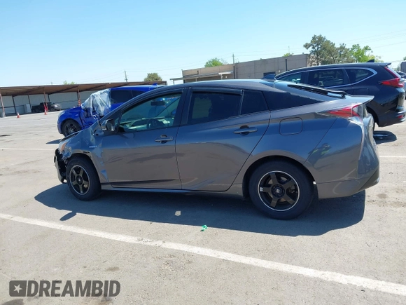2016 Toyota Prius Two z VIN JTDKBRFU1G3521884, wystawiony jako IAAI lot #42081852 z przebiegiem 93 107 mil mil oraz . Historia ofert i sprzedaży dostępna na DreamBid. Obrazek 14.