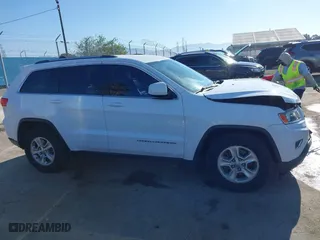 2014 Jeep Grand Cherokee Laredo with VIN 1C4RJEAGXEC130399, listed as a IAAI auction lot 41861664 with 106,925 mi miles. Bid and sale history available at carsss.com. Image 13.