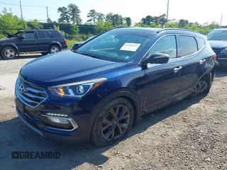 2018 Hyundai Santa Fe Ultimate with VIN 5XYZWDLA3JG571432, listed as a IAAI auction lot 42395245 with 69,330 mi miles and . Bid and sale history available at DreamBid. Image 2.