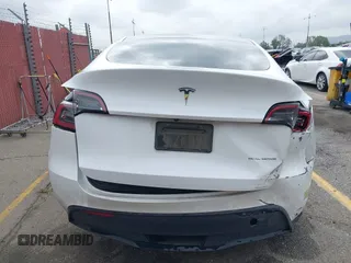 2023 Tesla Model Y Long Range with VIN 7SAYGAEE9PF702910, listed as a IAAI auction lot 42199519 with 91,094 mi miles and . Bid and sale history available at DreamBid. Image 16.