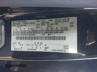2015 Ford Escape SE with VIN 1FMCU0G79FUA40322, listed as a IAAI auction lot 41791960 with 124,543 mi miles. Bid and sale history available at carsss.com. Image 9.