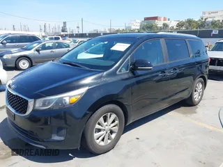 2016 Kia Sedona LX with VIN KNDMB5C13G6178411, listed as a IAAI auction lot 41993035 with 118,585 mi miles. Bid and sale history available at carsss.com. Image 2.