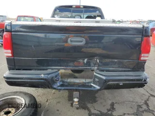 1999 Dodge Dakota SLT with VIN 1B7GG22Y5XS107729, listed as a Copart auction lot 79440034 with 163,718 mi miles and Salvage Title. Bid and sale history available at DreamBid. Image 6.