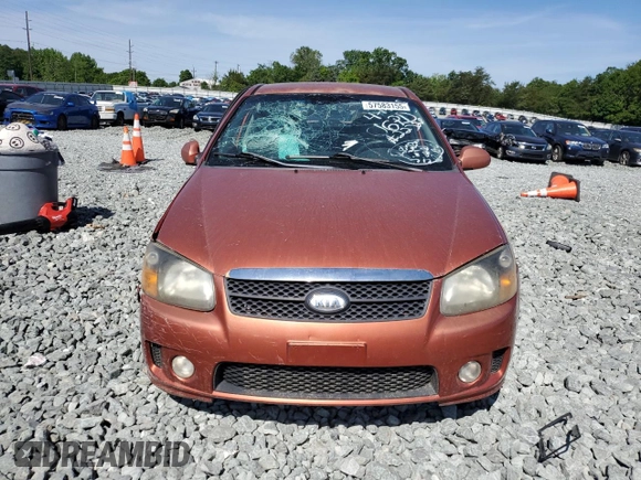 2009 Kia Spectra SX z VIN KNAFE221095025989, wystawiony jako Copart lot #57583155 z przebiegiem 261 776 mil mil oraz Szkoda całkowita • Salvage title. Historia ofert i sprzedaży dostępna na DreamBid. Obrazek 5.