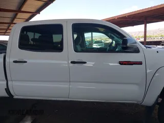 2015 Toyota Tacoma with VIN 3TMMU4FN0FM084956, listed as a IAAI auction lot 42184249 with 116,576 mi miles and . Bid and sale history available at DreamBid. Image 14.