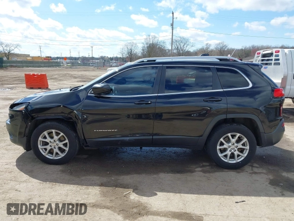 2014 Jeep Cherokee Latitude with VIN 1C4PJMCS6EW219999, listed as a IAAI auction lot 42044695 with 169,533 mi miles and . Bid and sale history available at carsss.com. Image 15.
