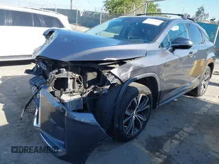 2020 Lexus RX 350 z VIN 2T2HZMAA3LC153162, wystawiony jako IAAI lot #42292460 z przebiegiem 112 913 mil mil oraz . Historia ofert i sprzedaży dostępna na DreamBid. Obrazek 2.