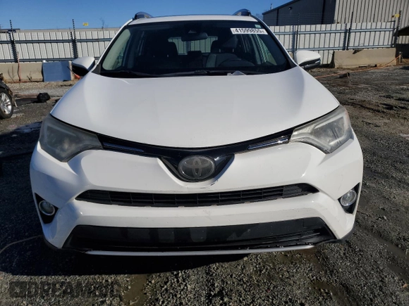 2018 Toyota RAV4 XLE with VIN 2T3WFREV2JW454202, listed as a Copart auction lot 41599855 with 144,442 mi miles and Salvage title. Bid and sale history available at DreamBid. Image 5.