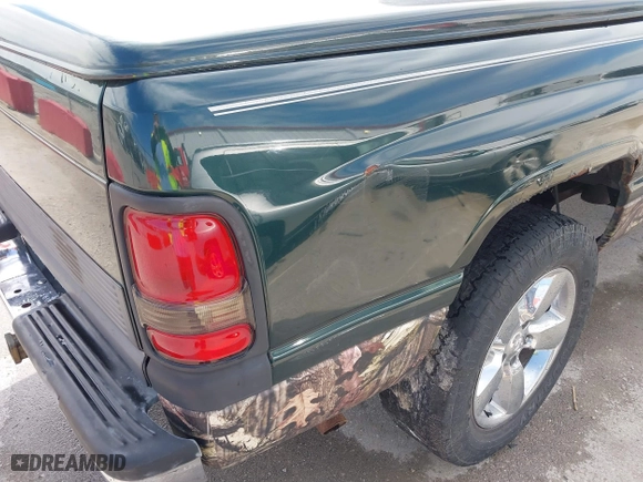 2000 Dodge Ram 1500 with VIN 1B7HC13Y0YJ119724, listed as a IAAI auction lot 41857558 with 173,330 mi miles. Bid and sale history available at carsss.com. Image 6.